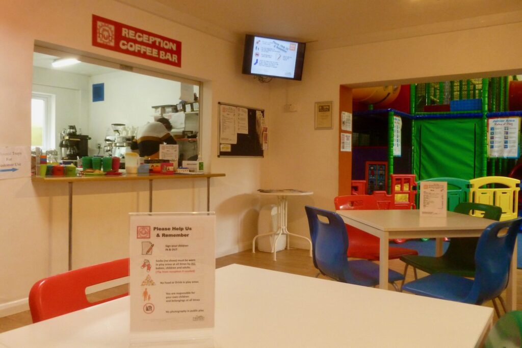 The coffee bar leading into the soft play area